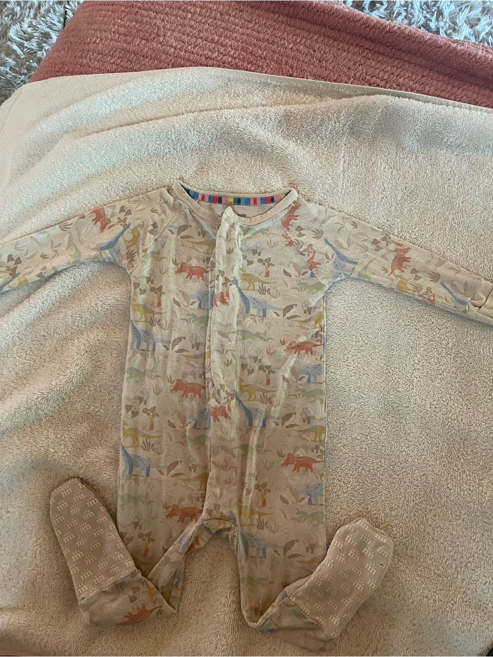 Magnetic Me baby bodysuit label with rainbow trim